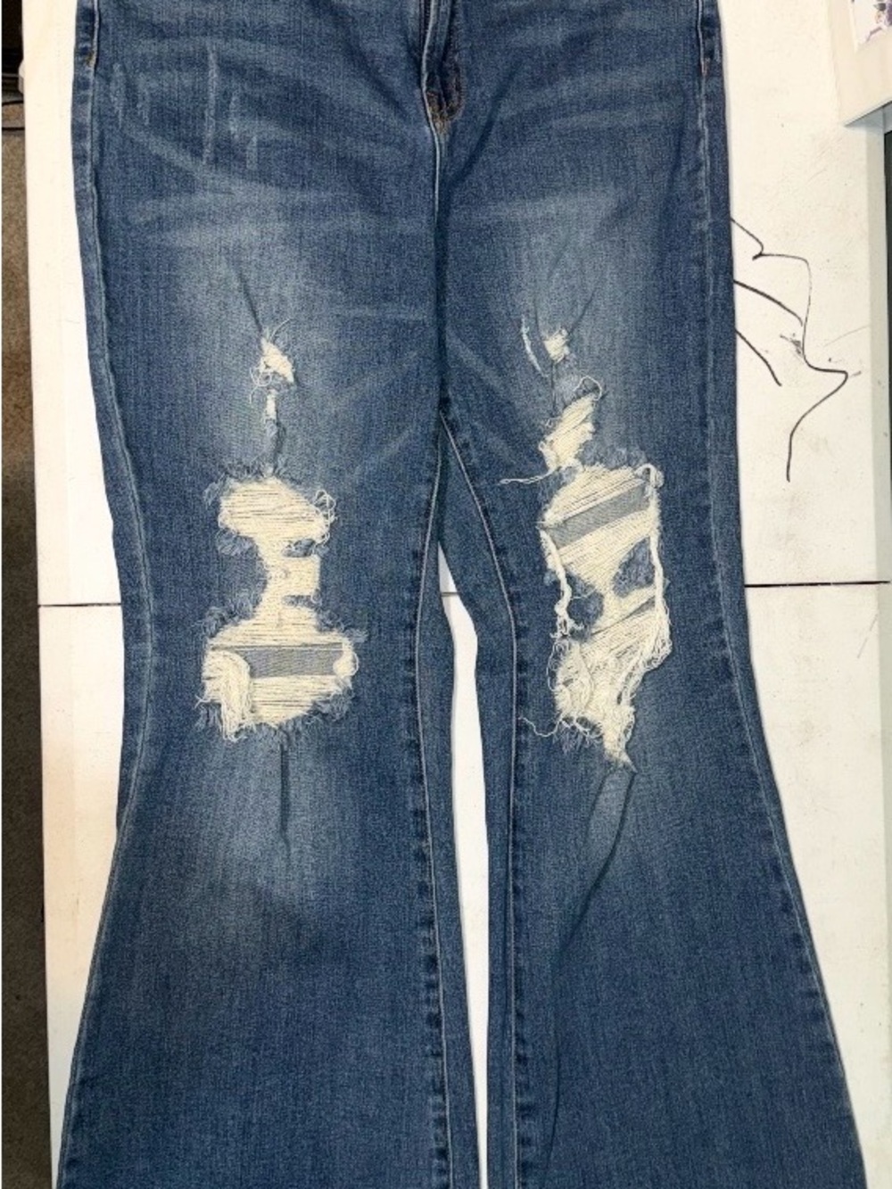 Risen Distressed Blue Flare Jeans for Women